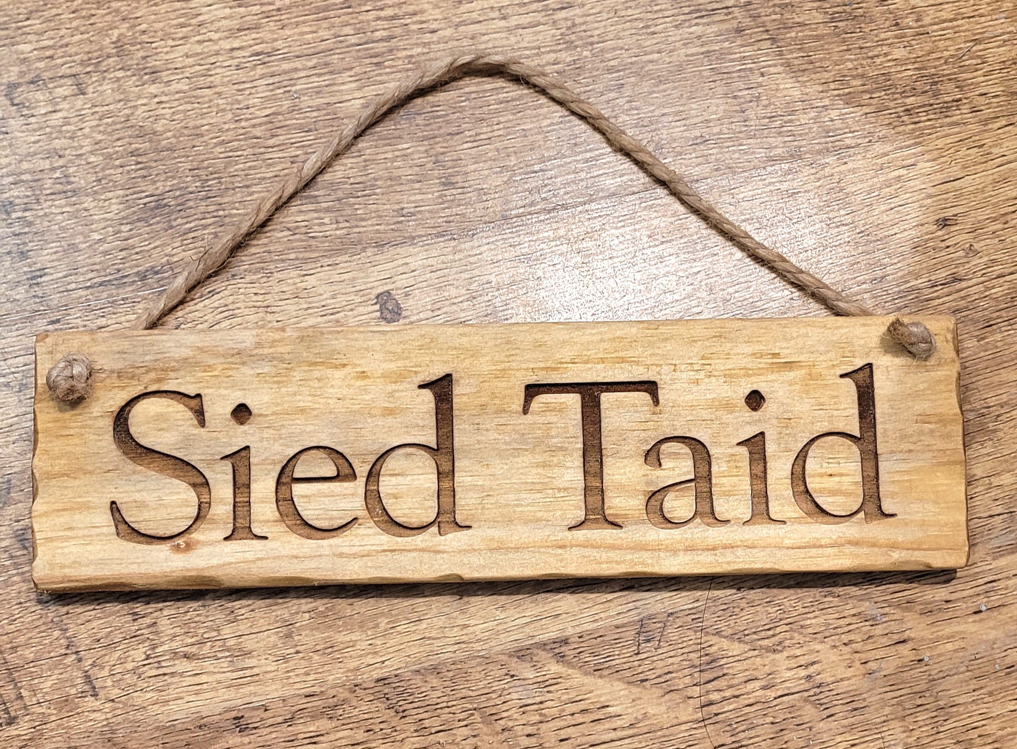 Sied Taid  wooden sign