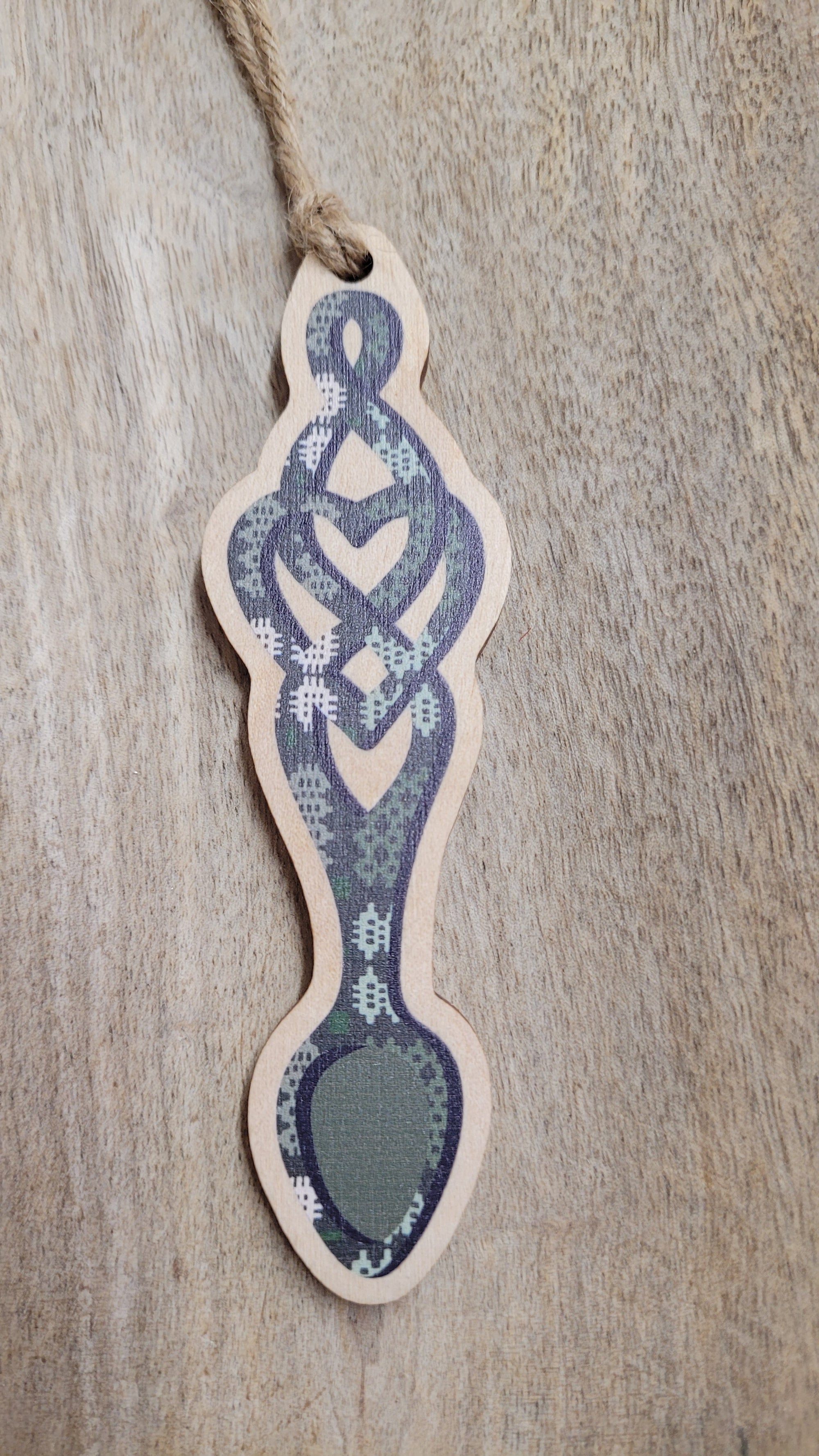 small wooden love spoon