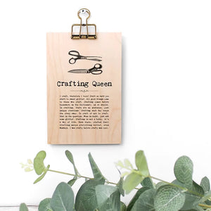 Image shows personlised wooden plaque with bulldog clip hanger.