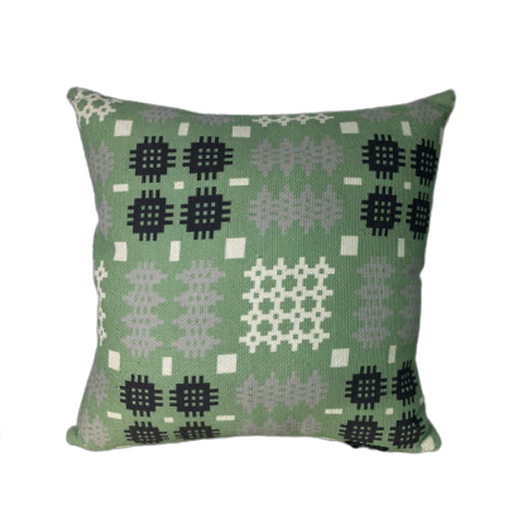 Image shows square shaped cushions in Pea green, mustard yellow and pale grey with traditional Welsh tapestry print design.