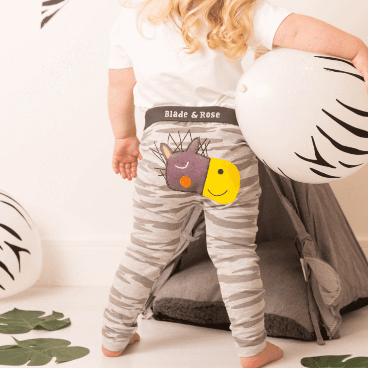 Image shows cute baby leggings with Zebra design on the bum.