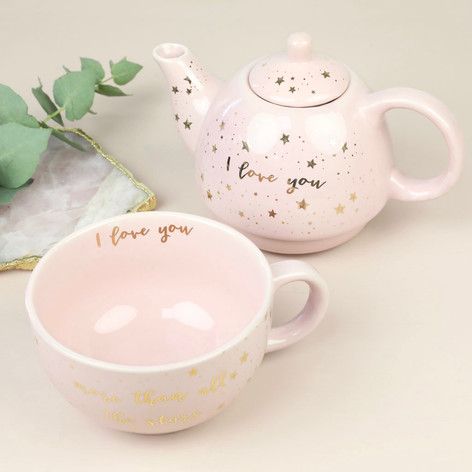 Image shows a pink ceramic teapot with 'I love you' inscription.