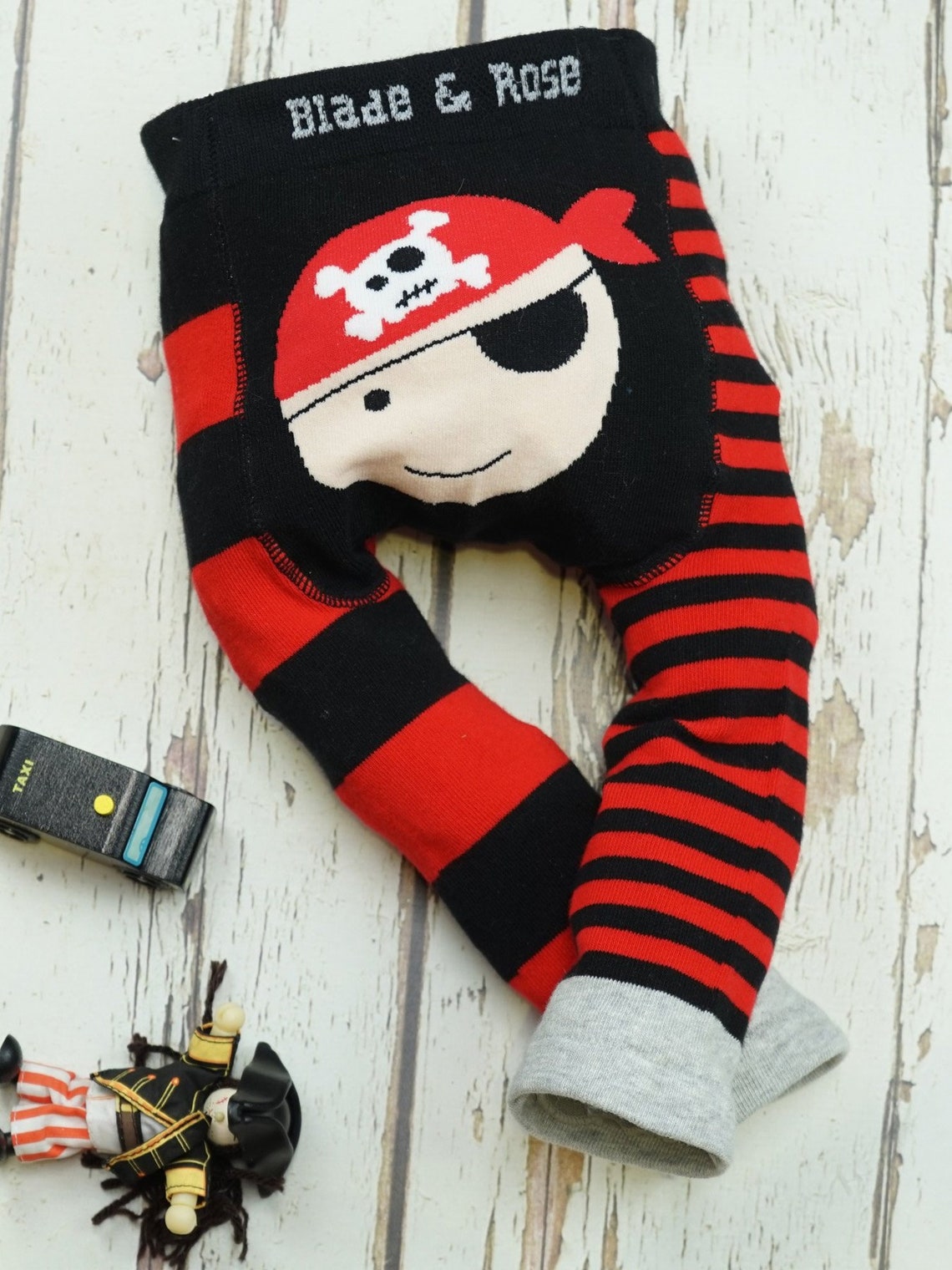 Image shows cute pirate leggings with Pirate design on the bum.