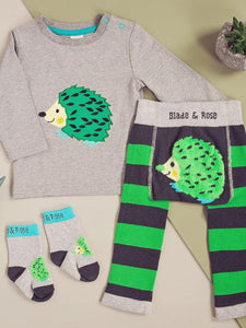 Image hows grey top with green Hedgehog design.